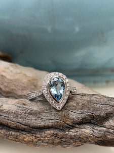 18ct W/G Aquamarine & Diamond Halo Ring