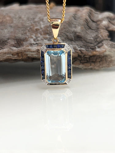 9ct Y/G Blue Topaz Sapphire & Diamond Pendant